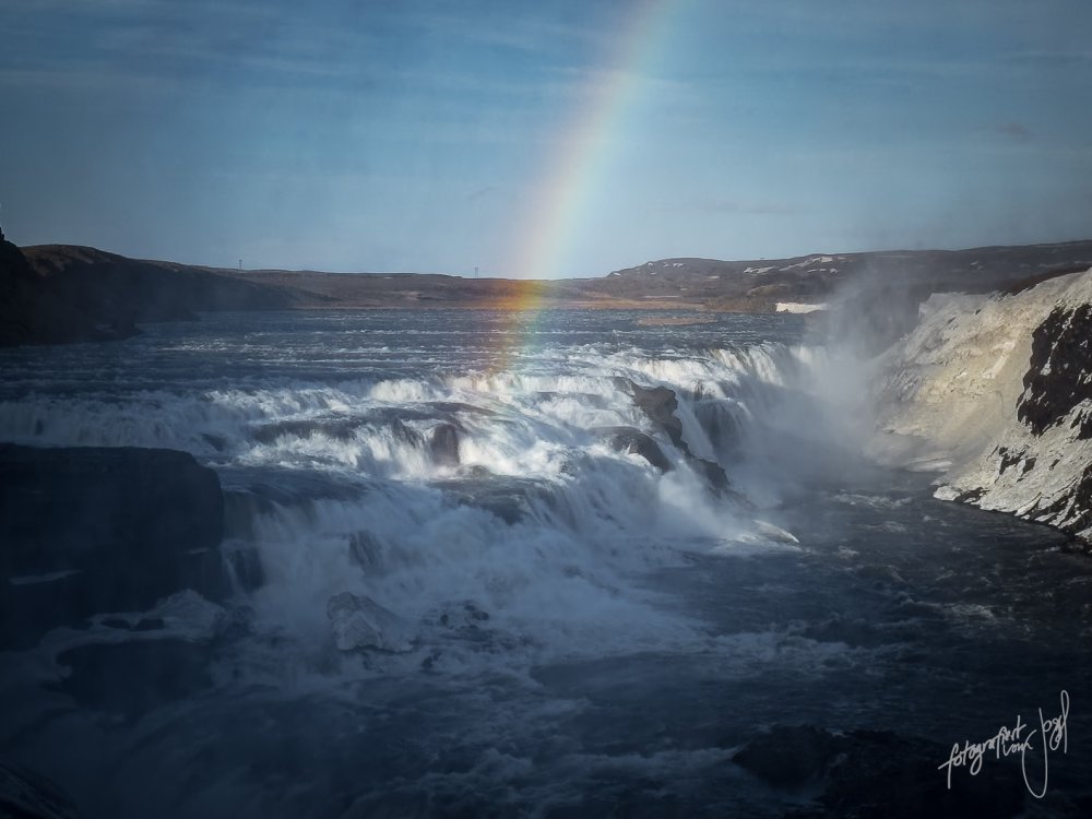 Regenbogen über dem Gullfoss